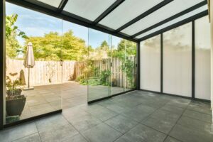 Glass wall separating the interior and exterior of a house